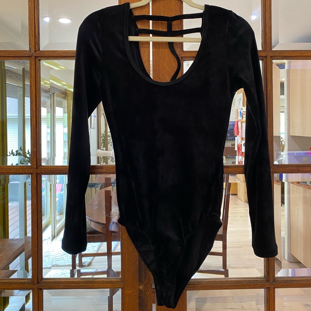 Self Esteem black velvet bodysuit. Long sleeve with fun back detail. Size M.
